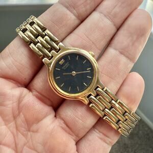 Vintage Ladies Seiko 1N00-0A99 BLACK Dial 22mm Gold Tone Dainty Stainless Watch